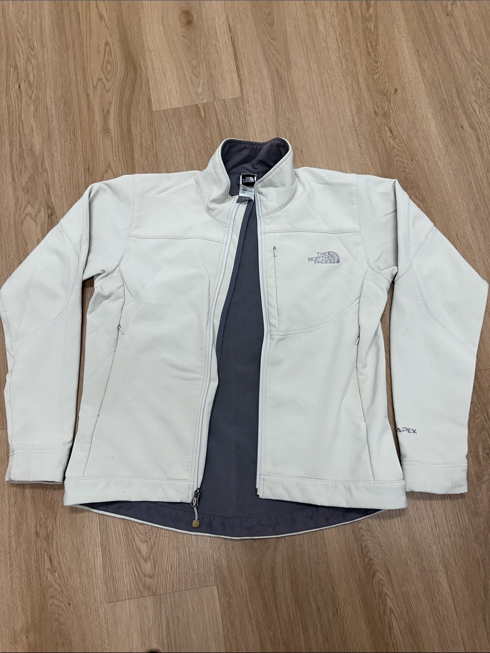 The North Face Cream Softshell Jacket with Dark Gray inside